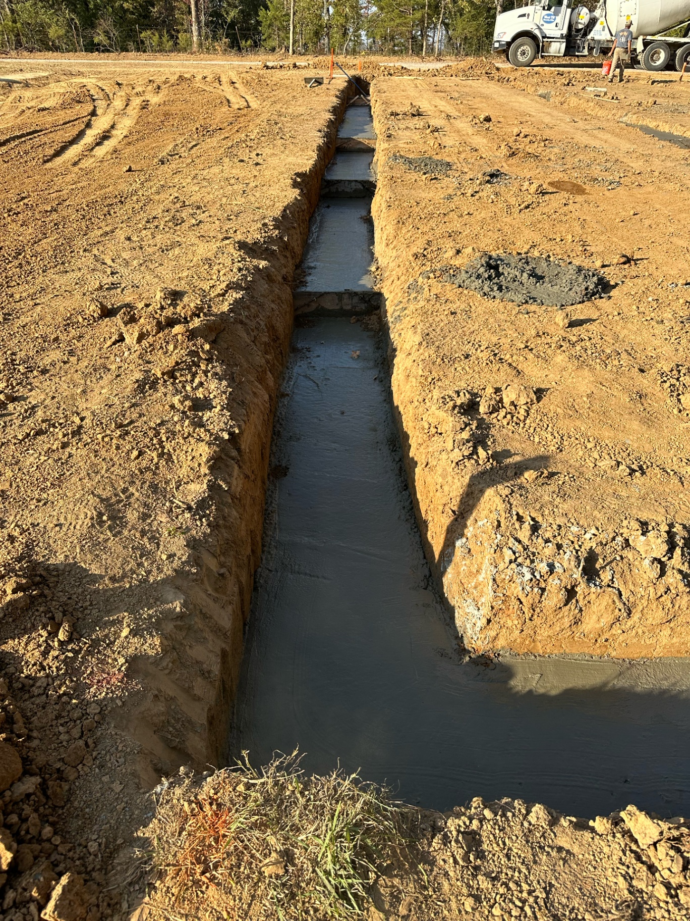 Concrete lined ditch installation in Millington TN