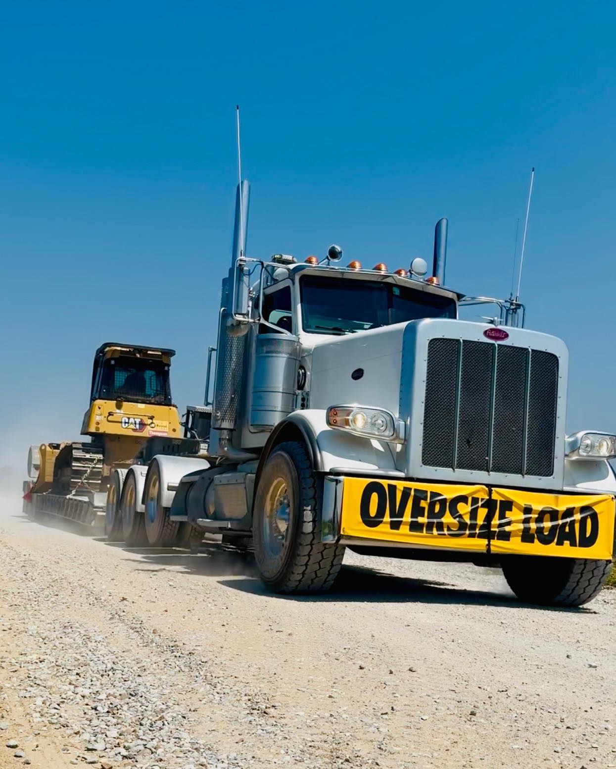 Modern Shovel oversize load hauling truck on highway in West Tennessee